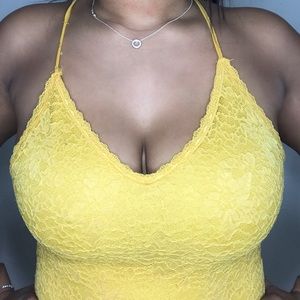 Yellow lace body suit